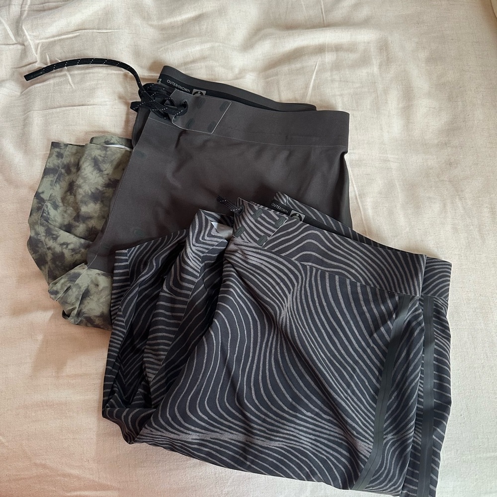 Two pairs of outerknown swim suit size 31